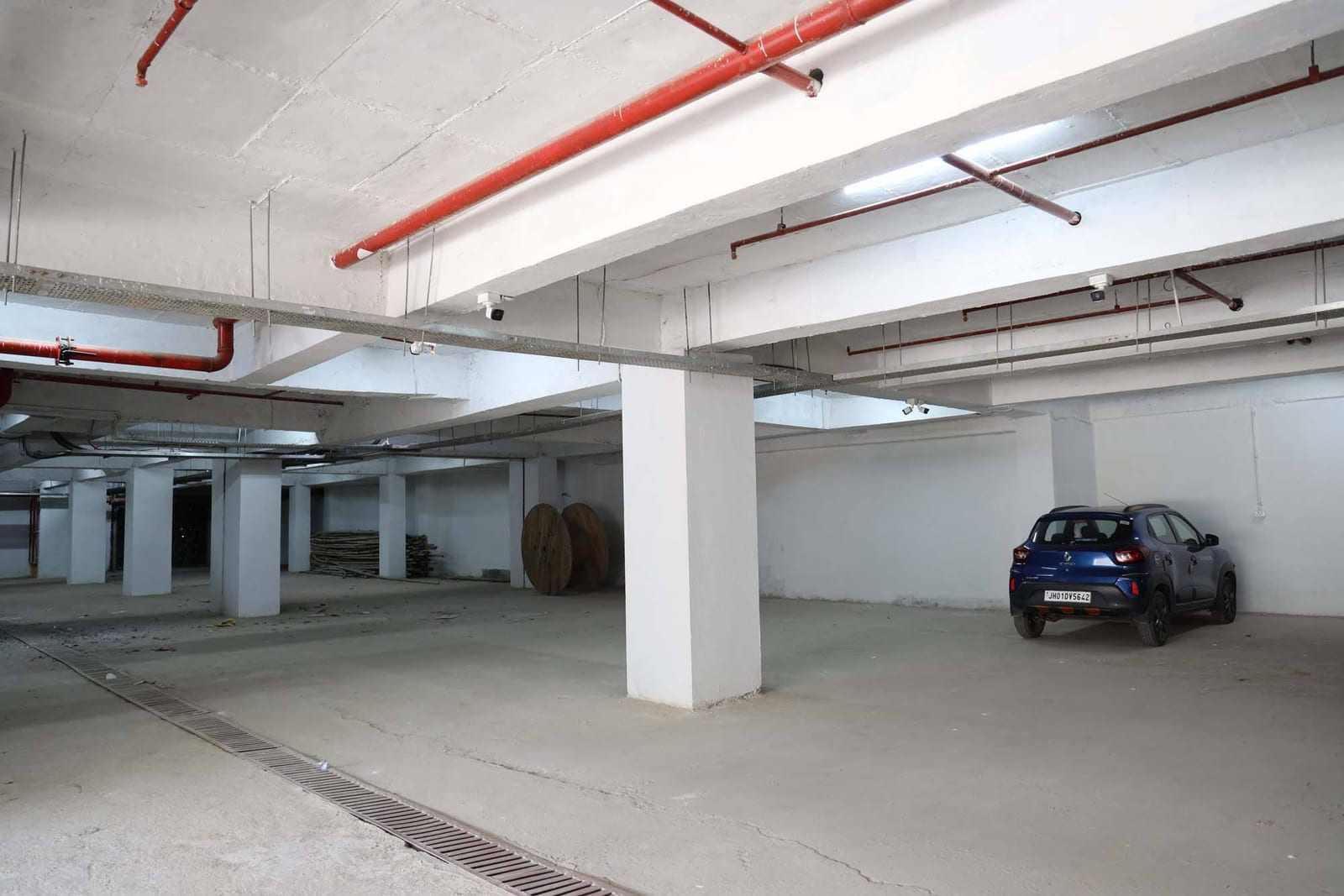 Covered multi-level parking with fire safety systems