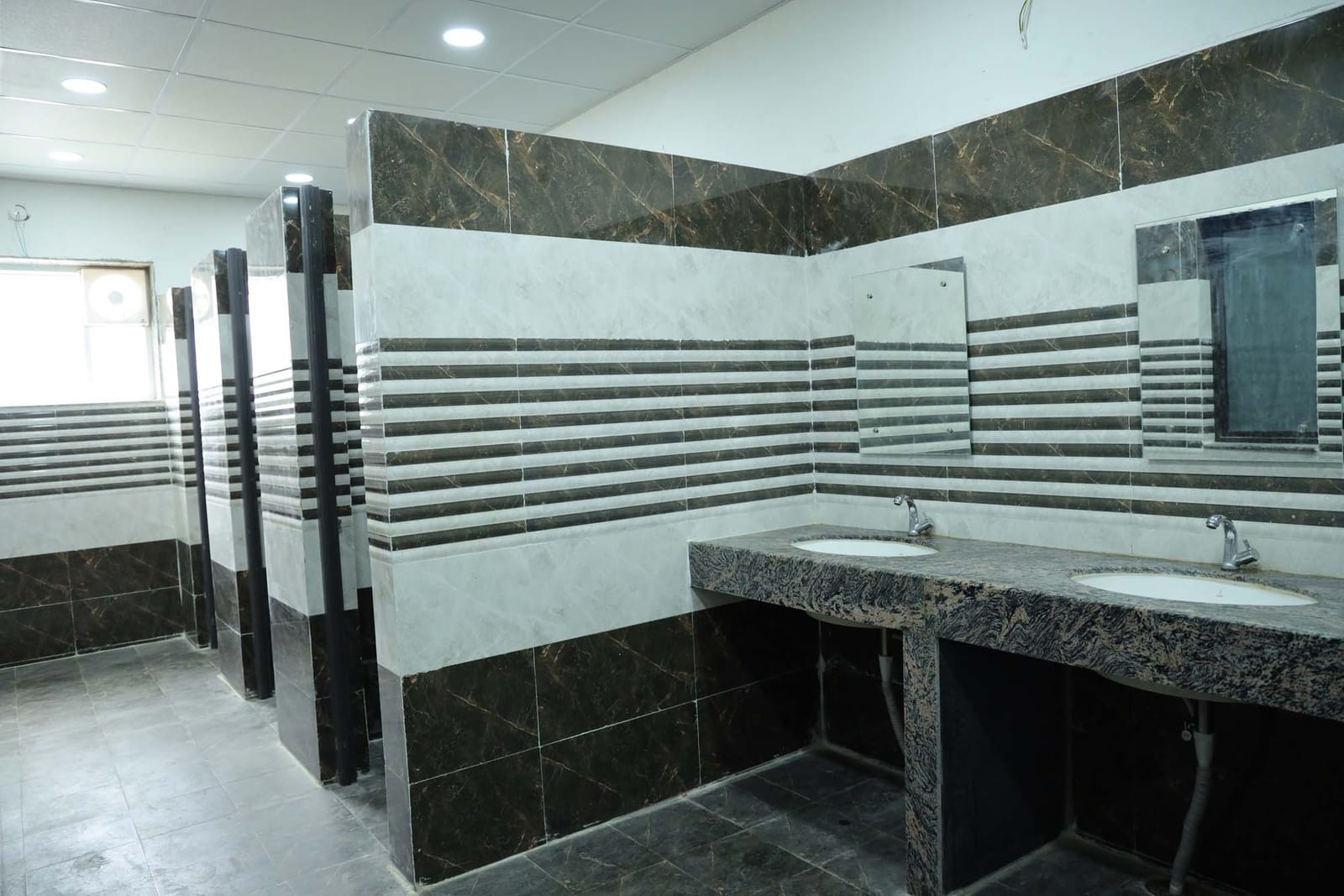 Modern restroom with granite counters